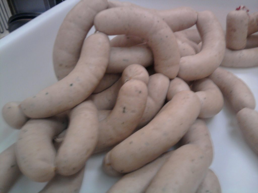 Weisswurst gekocht in Kochkesseln